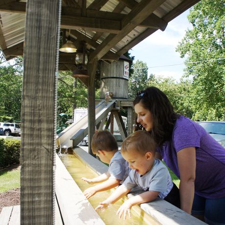 woman and children playing